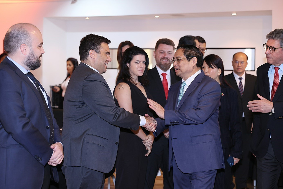 Thủ tướng Phạm Minh Chính với các doanh nghiệp Brazil. (Ảnh: Dương Giang/TTXVN)