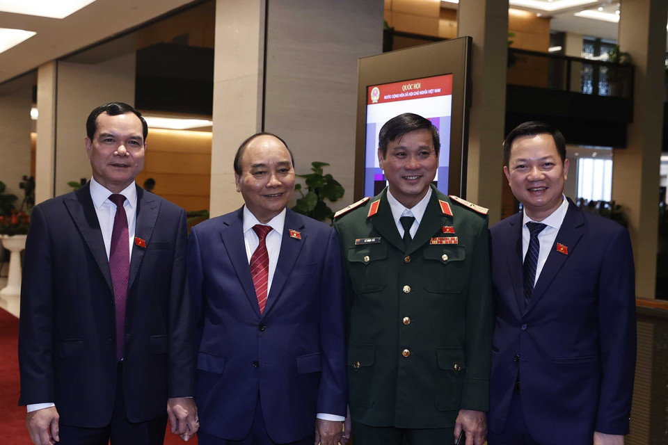 Chủ tịch nước Nguyễn Xuân Phúc và các đại biểu. (Ảnh: Thống Nhất/TTXVN)