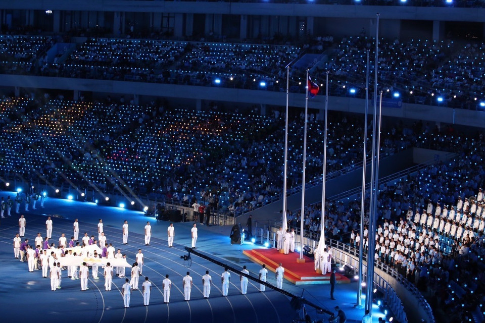 Nghi thức Thượng cờ Liên đoàn Thể thao Người Khuyết tật Đông Nam Á. (Ảnh: Huỳnh Thảo/TTXVN)