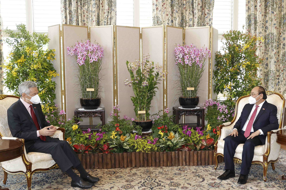 Sáng 25/2, Chủ tịch nước Nguyễn Xuân Phúc gặp Thủ tướng Singapore Lý Hiển Long. (Ảnh: Thống Nhất/TTXVN)