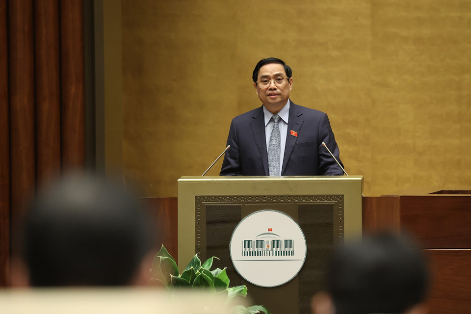 Thủ tướng Chính phủ nhiệm kỳ 2016-2021 Phạm Minh Chính trình bày Báo cáo giải trình, tiếp thu ý kiến của đại biểu Quốc hội về cơ cấu tổ chức của Chính phủ nhiệm kỳ 2021-2026. (Ảnh: Dương Giang/TTXVN)