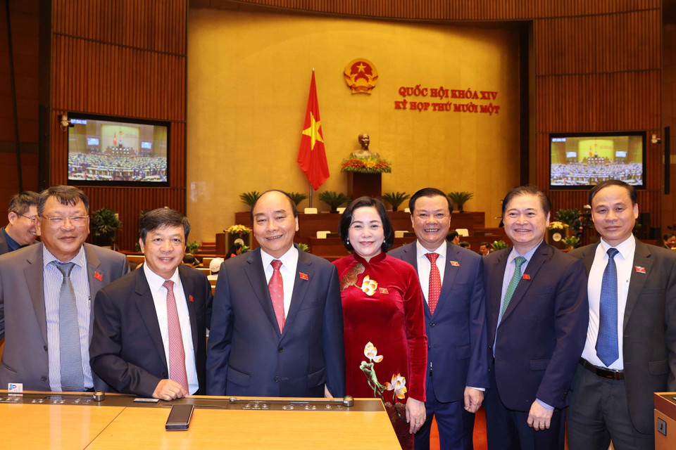 Thủ tướng Nguyễn Xuân Phúc và các đại biểu Quốc hội dự khai mạc kỳ họp lần thứ 11. (Ảnh: Thống Nhất/TTXVN)