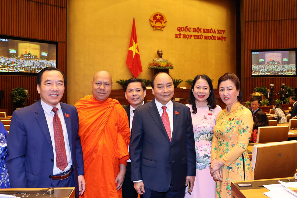 Thủ tướng Nguyễn Xuân Phúc và các đại biểu Quốc hội dự khai mạc kỳ họp lần thứ 11. (Ảnh: Thống Nhất/TTXVN)