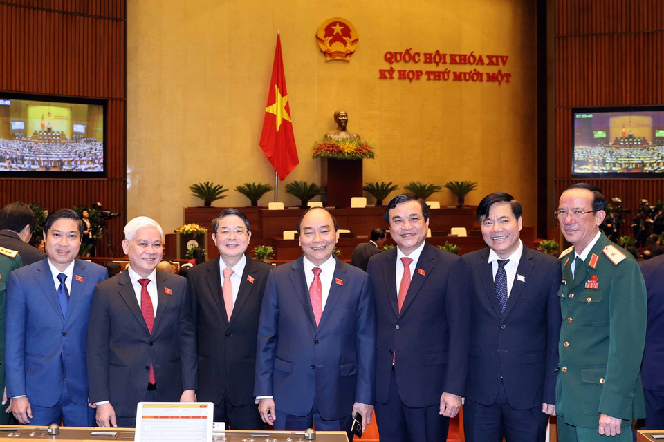 Thủ tướng Nguyễn Xuân Phúc và các đại biểu Quốc hội dự khai mạc kỳ họp lần thứ 11. (Ảnh: Thống Nhất/TTXVN)