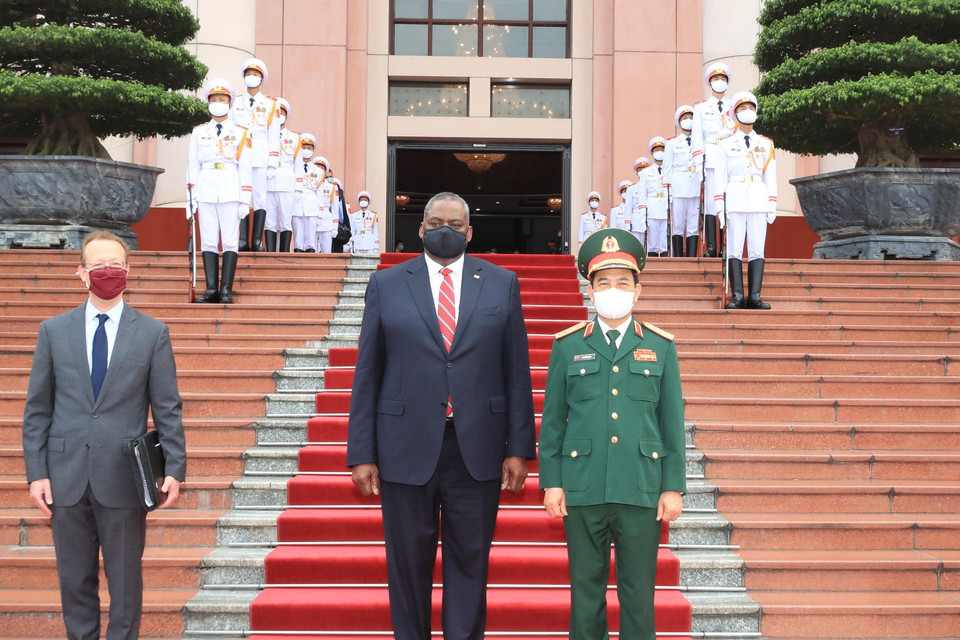 Đại tướng Phan Văn Giang, Bộ trưởng Quốc phòng và Bộ trưởng Quốc phòng Hoa Kỳ Lloyd Austin. (Ảnh: Trọng Đức/TTXVN)