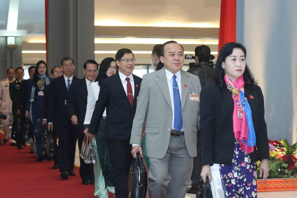 Các đại biểu đến dự phiên họp sáng 30/1. (Ảnh: TTXVN)