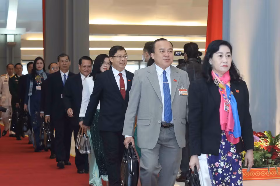 Các đại biểu đến dự phiên họp sáng 30/1. (Ảnh: TTXVN)