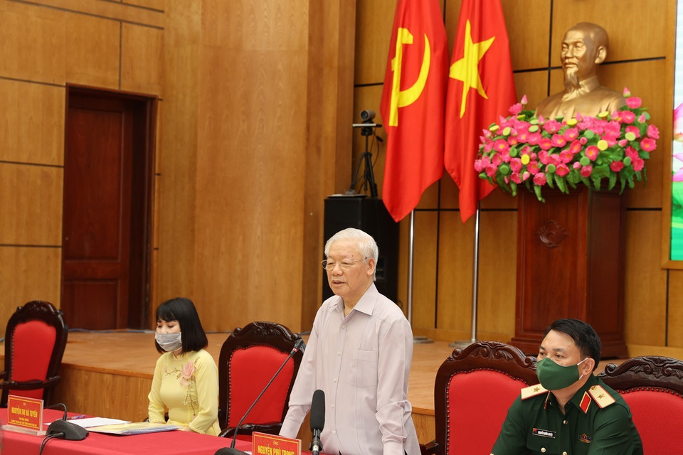 Tổng Bí thư Nguyễn Phú Trọng, Bí thư Quân ủy Trung ương trình bày Chương trình hành động. (Ảnh: Trí Dũng/TTXVN)