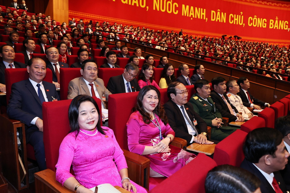 Các đại biểu tham dự ngày làm việc chính thức thứ hai Đại hội XIII của Đảng. (Ảnh: TTXVN)