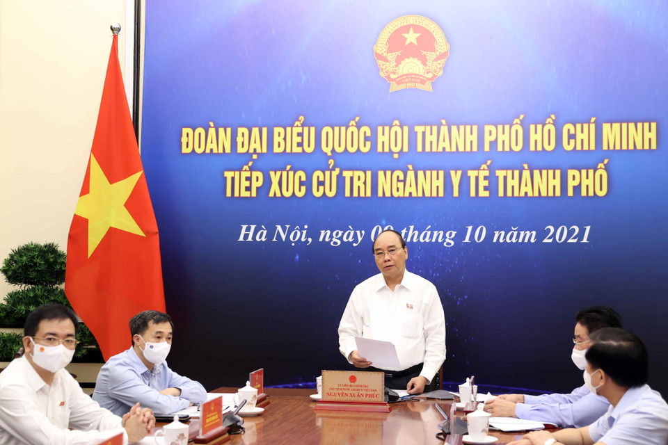 Chủ tịch nước Nguyễn Xuân Phúc phát biểu tại điểm cầu Hà Nội. (Ảnh: Thống Nhất/TTXVN)