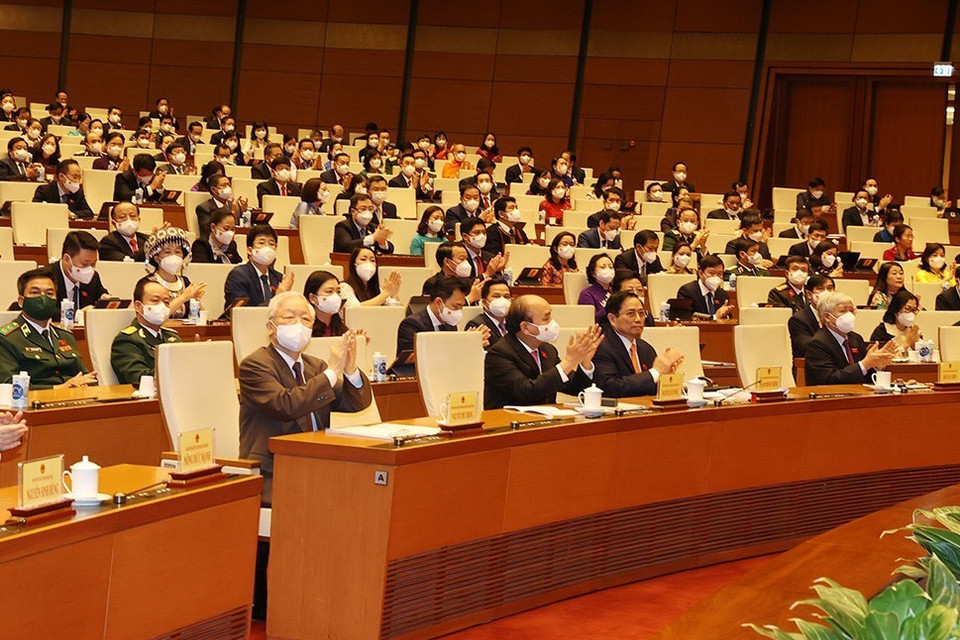 Tổng Bí thư Nguyễn Phú Trọng cùng các đồng chí lãnh đạo Đảng, Nhà nước và đại biểu dự phiên bế mạc Kỳ họp thứ hai, Quốc hội khóa XV. (Ảnh: Trí Dũng/TTXVN)