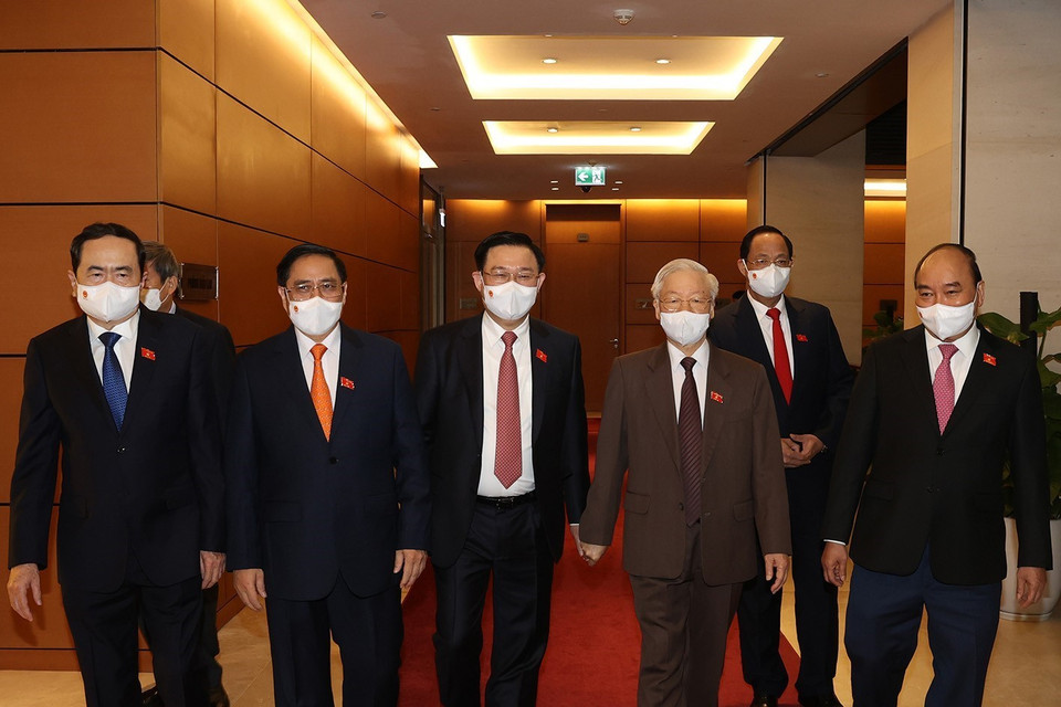 Tổng Bí thư Nguyễn Phú Trọng, Chủ tịch nước Nguyễn Xuân Phúc, Thủ tướng Chính phủ Phạm Minh Chính, Chủ tịch Quốc hội Vương Đình Huệ dự bế mạc Kỳ họp thứ hai, Quốc hội khóa XV. (Ảnh: Trí Dũng/TTXVN)