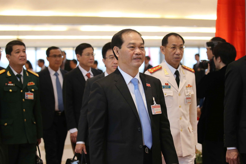  Các đại biểu đến dự ngày làm việc chính thức thứ hai Đại hội XIII của Đảng. (Ảnh: TTXVN)