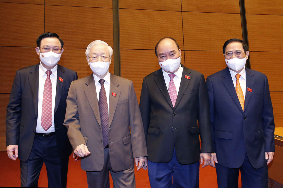 Tổng Bí thư Nguyễn Phú Trọng, Chủ tịch nước Nguyễn Xuân Phúc, Thủ tướng Phạm Minh Chính, Chủ tịch Quốc hội Vương Đình Huệ dự phiên họp. (Ảnh: Doãn Tấn/TTXVN)