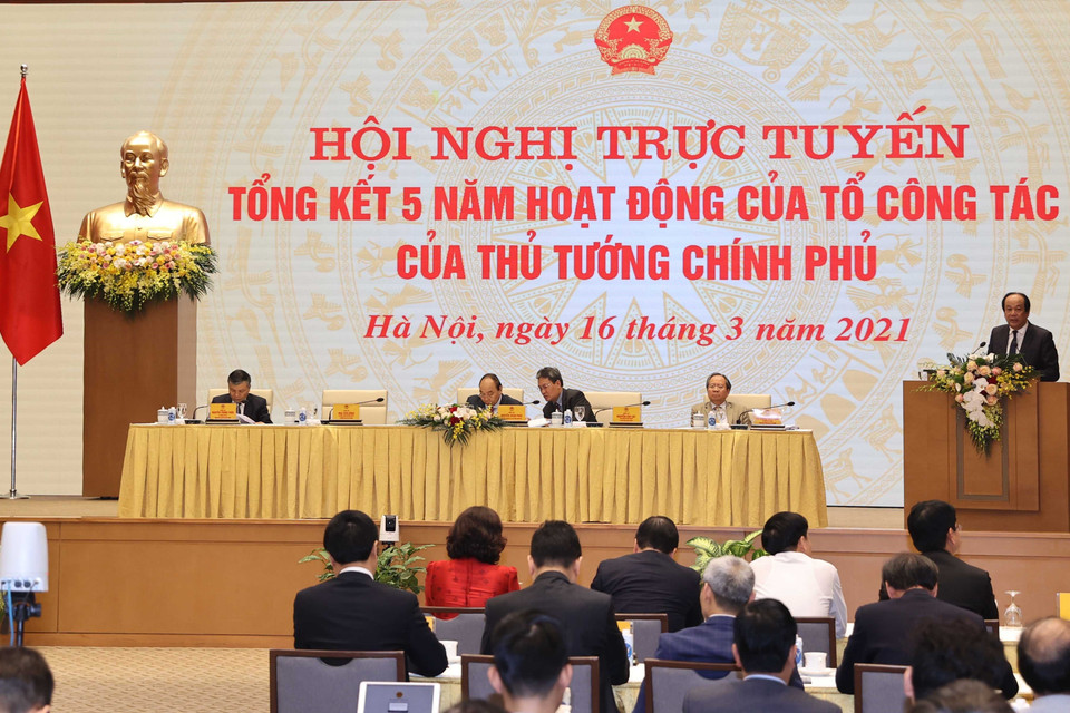 Bộ trưởng, Chủ nhiệm Văn phòng Chính phủ Mai Tiến Dũng, Tổ trưởng Tổ công tác của Thủ tướng báo cáo tổng kết 5 năm. (Ảnh: Thống Nhất/TTXVN)