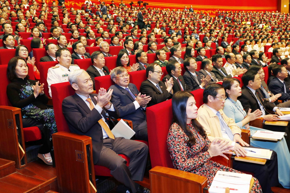 Các đại biểu tham dự ngày làm việc chính thức thứ hai Đại hội XIII của Đảng. (Ảnh: TTXVN)