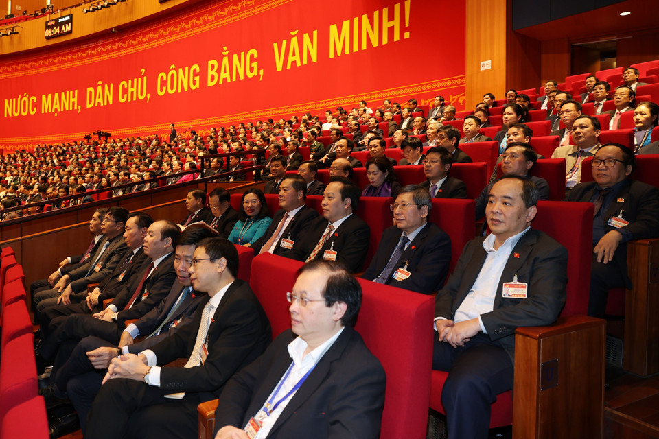 Các đại biểu đến dự ngày làm việc chính thức thứ hai Đại hội XIII của Đảng. (Ảnh: TTXVN)