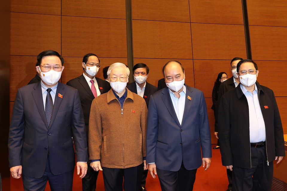 Hình ảnh Tổng Bí thư Nguyễn Phú Trọng, Chủ tịch nước Nguyễn Xuân Phúc,Thủ tướng Chính phủ Phạm Minh Chính, Chủ tịch Quốc hội Vương Đình Huệ dự Kỳ họp thứ hai, Quốc hội khóa XV. (Ảnh: Trí Dũng/TTXVN)