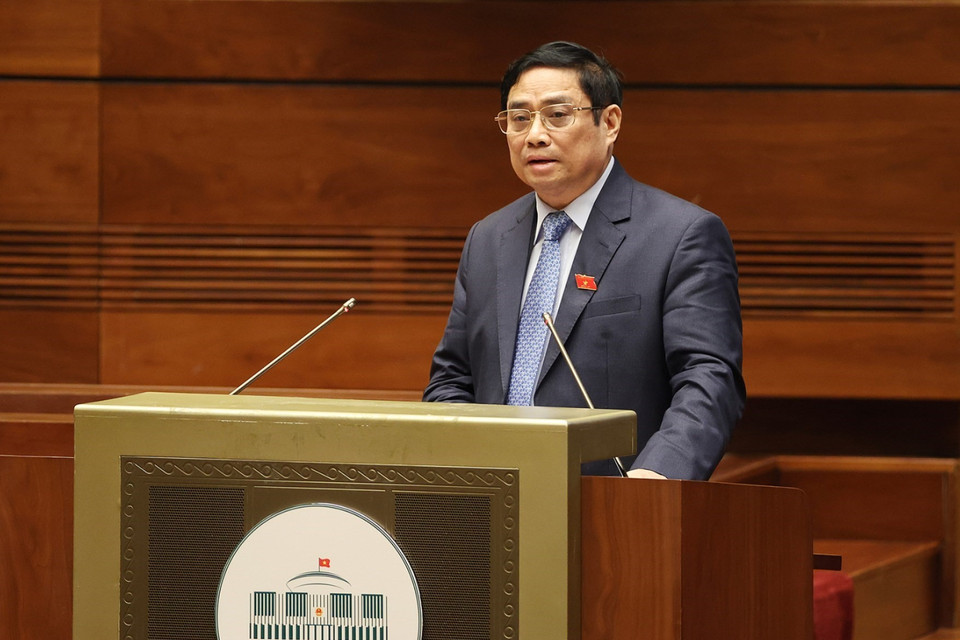 Hình ảnh Thủ tướng Chính phủ Phạm Minh Chính trình bày Báo cáo kết quả thực hiện kế hoạch phát triển kinh tế-xã hội năm 2021; dự kiến kế hoạch phát triển kinh tế-xã hội năm 2022. (Ảnh: Dương Giang/TTXVN)