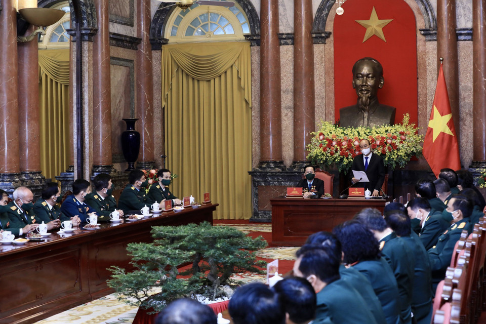 Chủ tịch nước Nguyễn Xuân Phúc phát biểu, ghi nhận những nỗ lực của các doanh nghiệp, doanh nhân cựu chiến binh trong sản xuất kinh doanh, đóng góp vào các hoạt động xã hội, đặc biệt là công tác phòng, chống COVID-19. (Ảnh: Lâm Khánh/TTXVN)