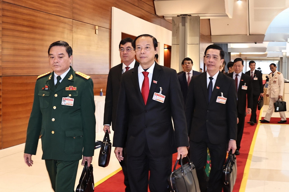  Các đại biểu đến dự ngày làm việc chính thức thứ hai Đại hội XIII của Đảng. (Ảnh: TTXVN)