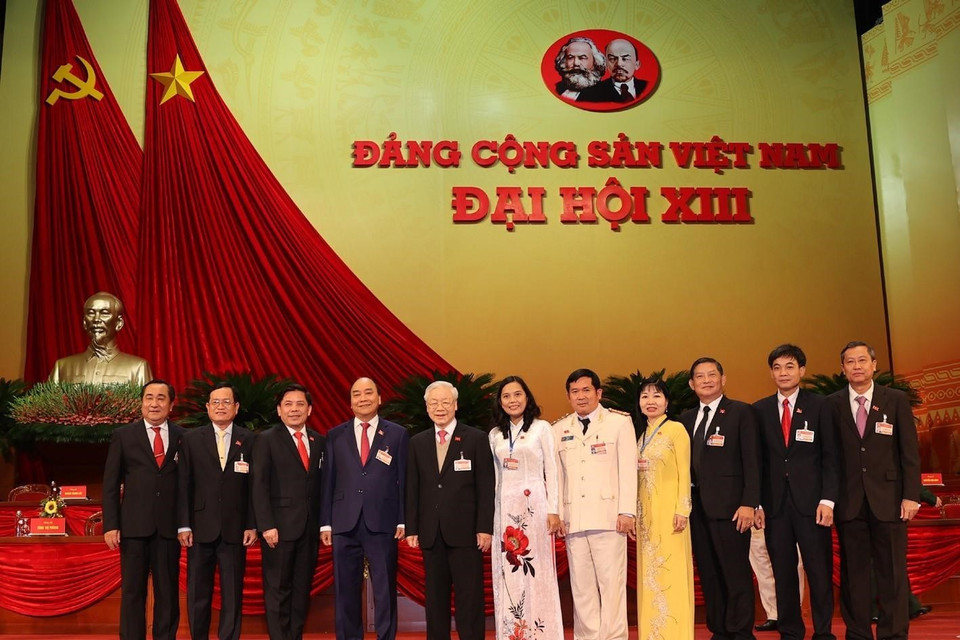  Tổng Bí thư, Chủ tịch nước Nguyễn Phú Trọng và Thủ tướng Chính phủ Nguyễn Xuân Phúc với các đại biểu. (Ảnh: TTXVN)