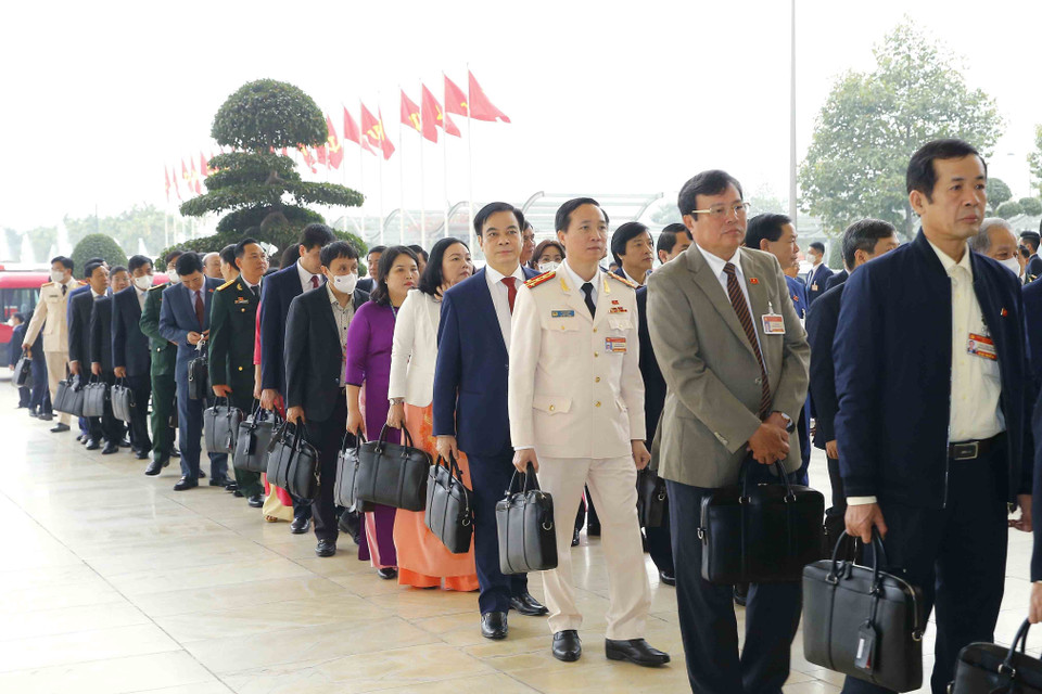 Đại biểu đến dự Đại hội, sáng 28/1. (Ảnh: TTXVN)