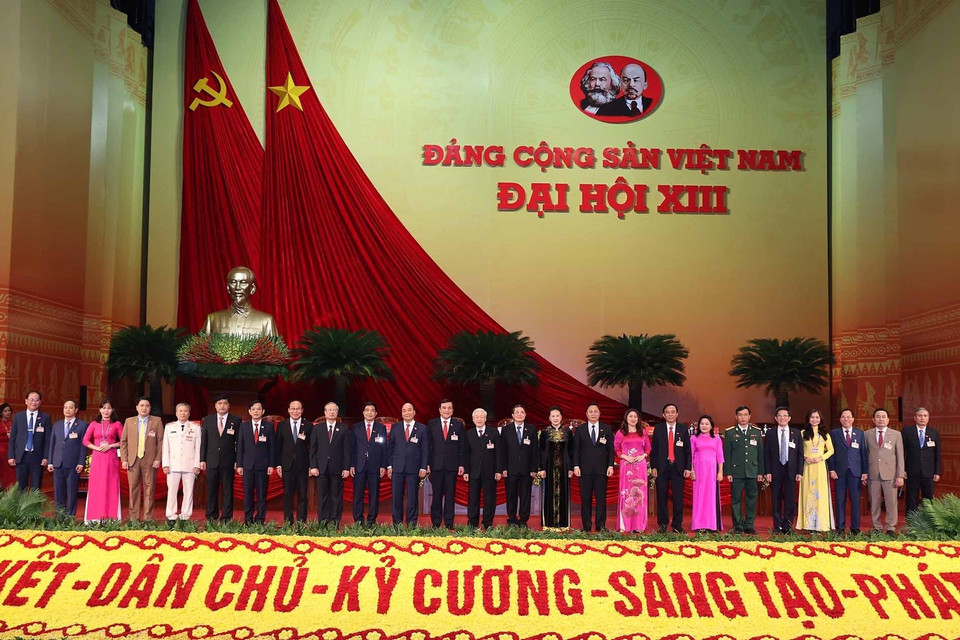 Lãnh đạo Đảng, Nhà nước chụp ảnh chung với Đoàn đại biểu Đảng bộ tỉnh Quảng Nam. (Ảnh: TTXVN)