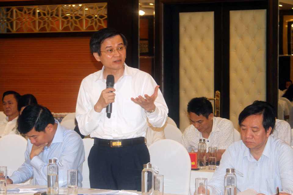 Ông Đoàn Minh Huấn, Ủy viên Trung ương Đảng, Ủy viên Ban Chấp hành Đảng bộ Khối các cơ quan Trung ương, Tổng Biên tập Tạp chí Cộng sản phát biểu tại hội nghị. (Ảnh: Tá Chuyên/TTXVN)