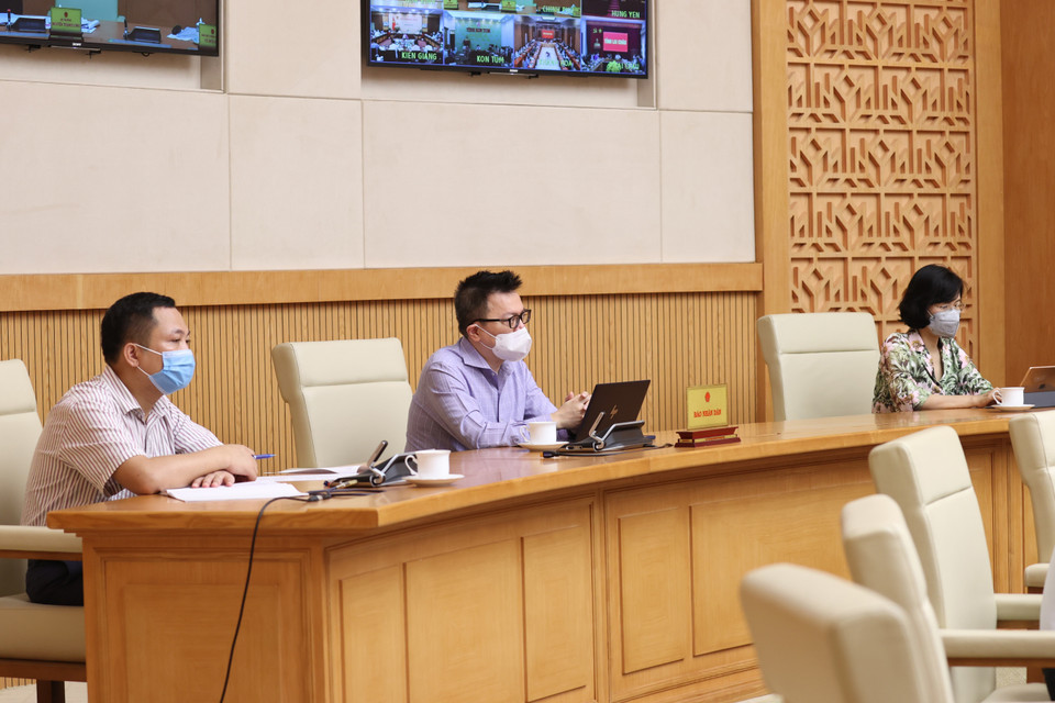 Đại diện các cơ quan báo chí tham dự Hội nghị tại điểm cầu trụ sở Chính phủ. (Ảnh: Dương Giang/TTXVN)