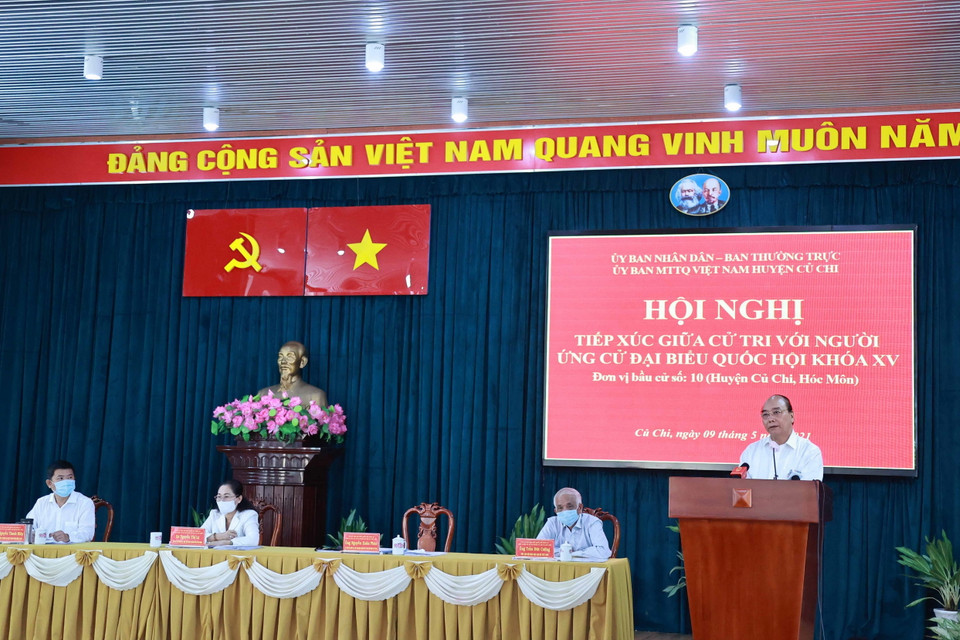 Chủ tịch nước Nguyễn Xuân Phúc trình bày chương trình hành động tại buổi tiếp xúc cử tri huyện Củ Chi ngày 9/5. (Ảnh: Thống Nhất/TTXVN)