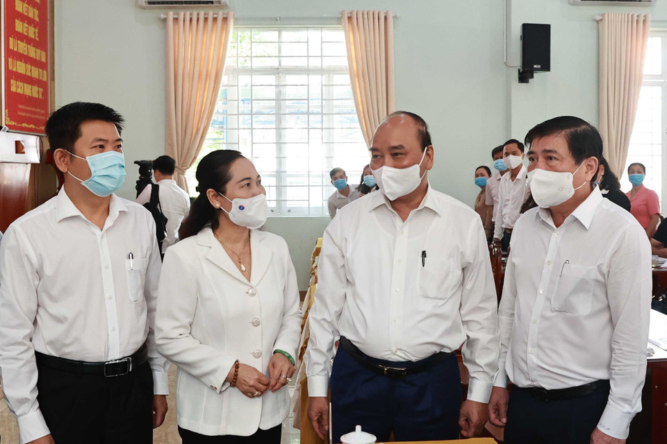 Chủ tịch nước Nguyễn Xuân Phúc tiếp xúc cử tri xã Đức Nhuận, Phạm Văn Cội và Phú Hòa Đông, huyện Củ Chi ngày 9/5. (Ảnh: Thống Nhất/TTXVN)