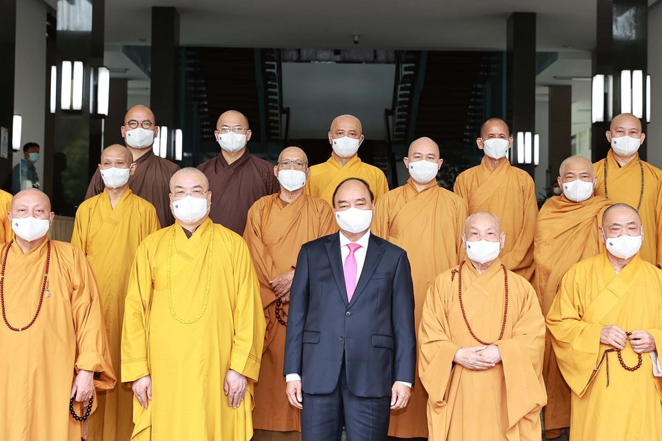 Chủ tịch nước Nguyễn Xuân Phúc với các đại biểu tại buổi tiếp. (Ảnh: Thống Nhất/TTXVN)