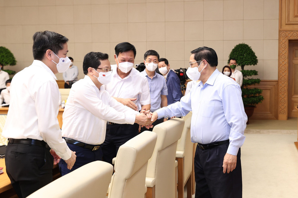 Thủ tướng Phạm Minh Chính với các đại biểu. (Ảnh: Dương Giang/TTXVN)