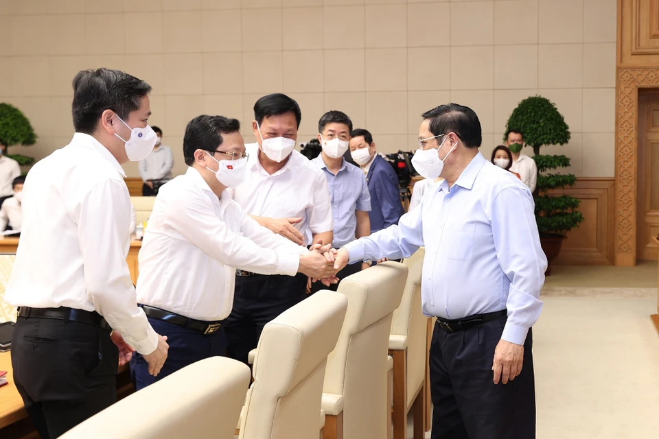 Thủ tướng Phạm Minh Chính với các đại biểu. (Ảnh: Dương Giang/TTXVN)