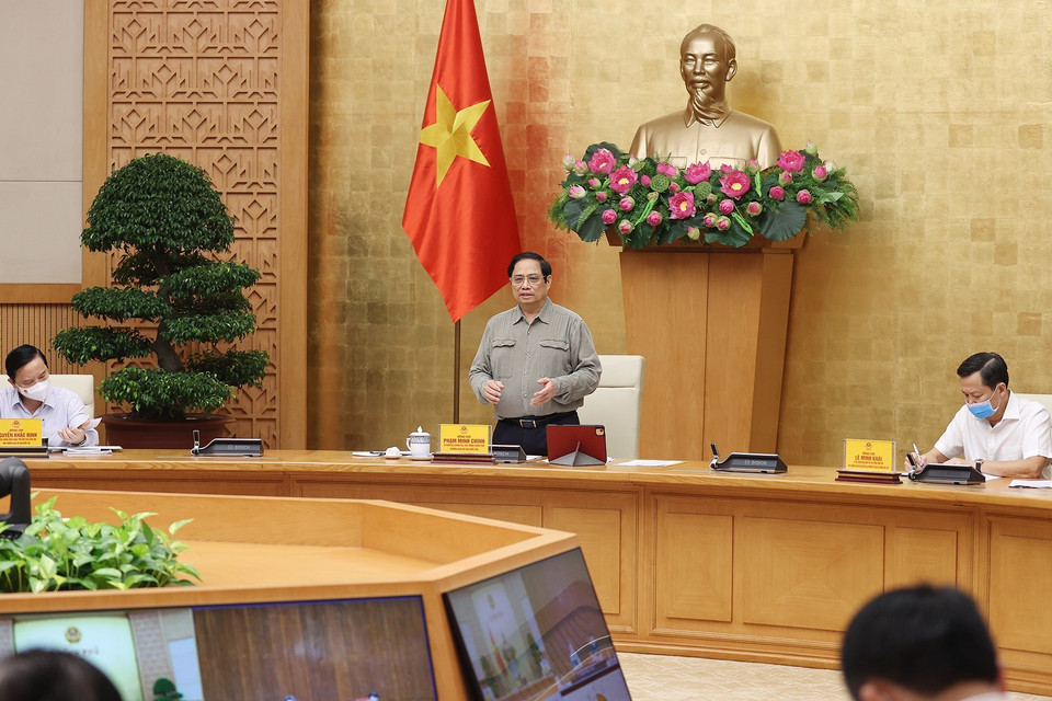 Thủ tướng Phạm Minh Chính chủ trì họp Ban Chỉ đạo Quốc gia phòng, chống dịch COVID-19. (Ảnh: Dương Giang/TTXVN)