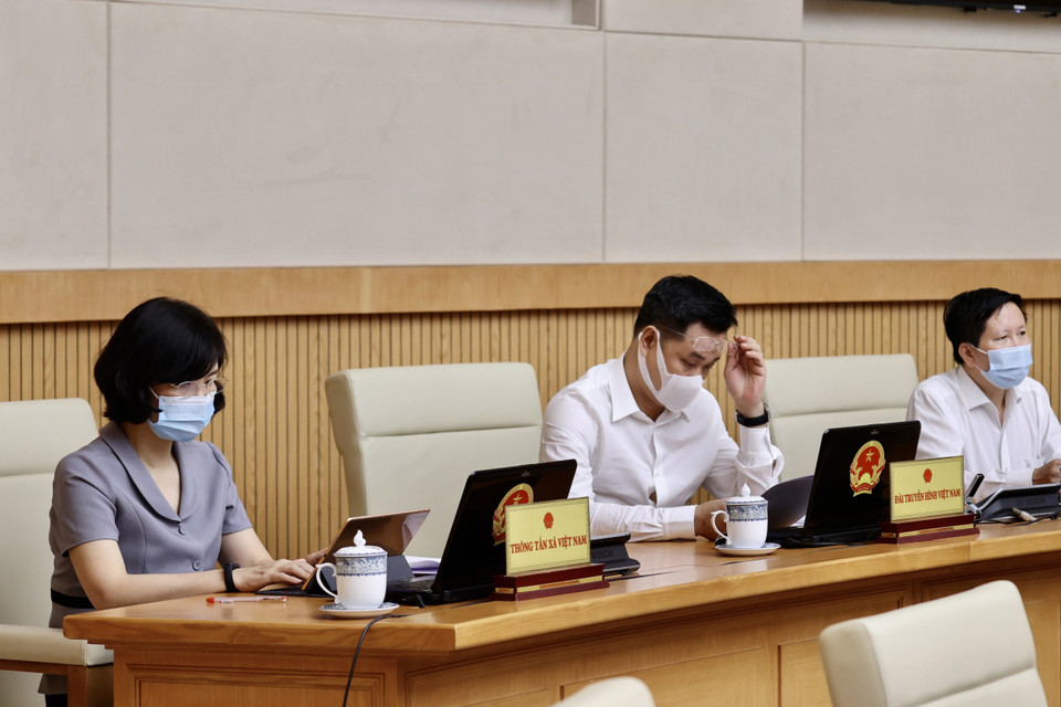 Đại diện Thông tấn xã Việt Nam, Đài Truyền hình Việt Nam, Đài Tiếng nói Việt Nam tham dự phiên họp. (Ảnh: Dương Giang/TTXVN)