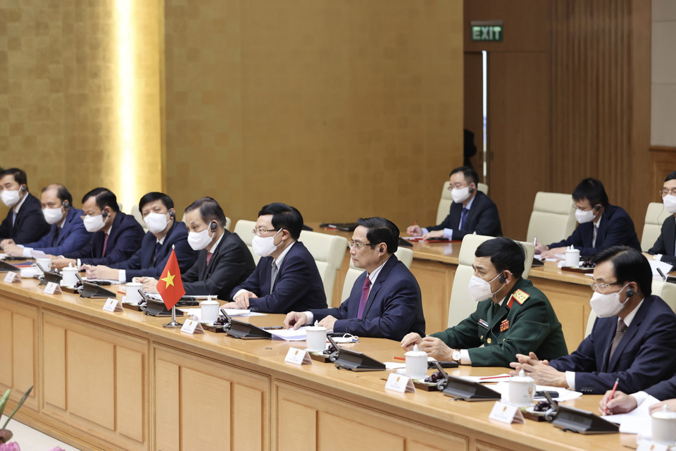 Thủ tướng Chính phủ Phạm Minh Chính và các thành viên Đoàn Việt Nam tại buổi hội kiến. (Ảnh: Dương Giang/TTXVN)