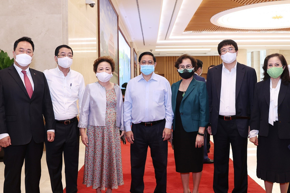 Thủ tướng Phạm Minh Chính với các đại biểu. (Ảnh: Dương Giang/TTXVN)