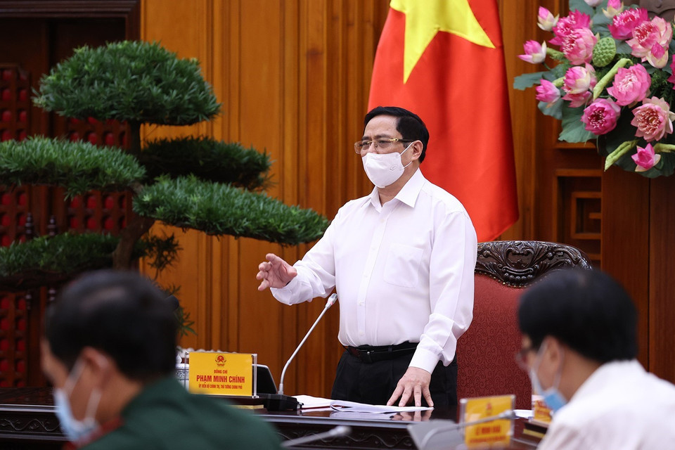 Thủ tướng Phạm Minh Chính yêu cầu thực hiện nghiêm túc các biện pháp phòng, chống dịch trong các khu công nghiệp. (Ảnh: Dương Giang/TTXVN)