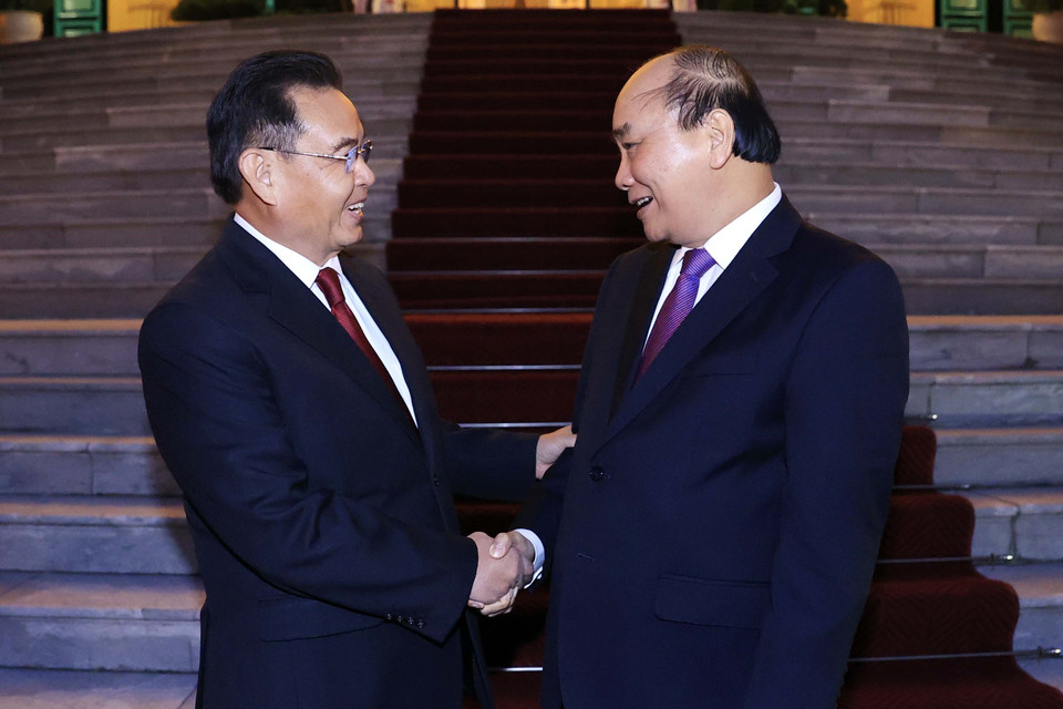 Chủ tịch nước Nguyễn Xuân Phúc và Chủ tịch Quốc hội Lào Xaysomphone Phomvihane. (Ảnh: Thống Nhất/TTXVN)