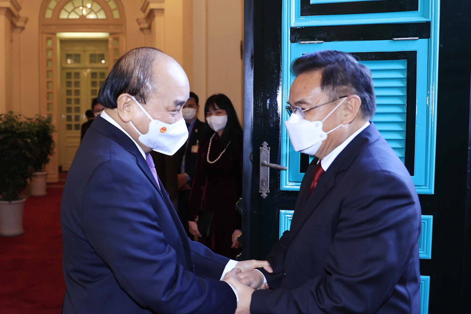 Chủ tịch nước Nguyễn Xuân Phúc và Chủ tịch Quốc hội Lào Xaysomphone Phomvihane. (Ảnh: Thống Nhất/TTXVN)