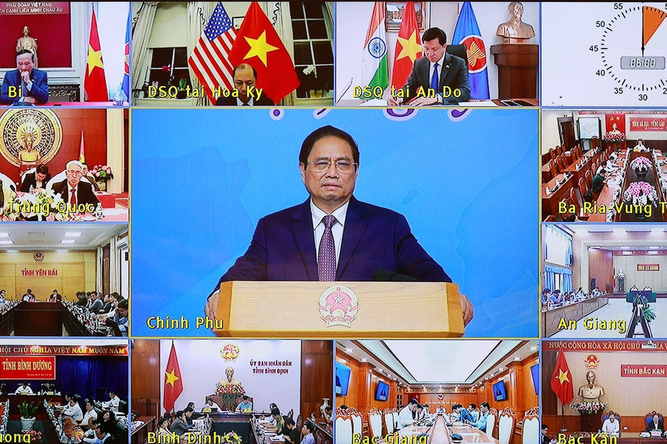 Hội nghị trực tuyến đến các điểm cầu trong và ngoài nước. (Ảnh: Dương Giang/TTXVN)