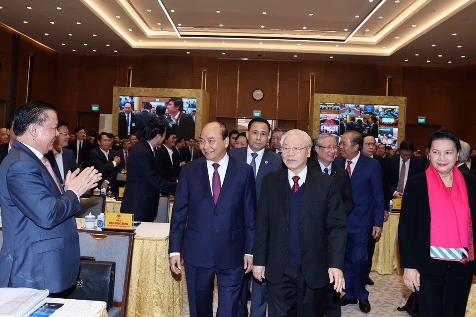 Tổng Bí thư, Chủ tịch nước Nguyễn Phú Trọng, Thủ tướng Nguyễn Xuân Phúc, Thủ tướng Nguyễn Xuân Phúc, Chủ tịch Quốc hội Nguyễn Thị Kim Ngân và các đại biểu đến dự tại điểm cầu Hà Nội. (Ảnh: Thống Nhất/TTXVN)