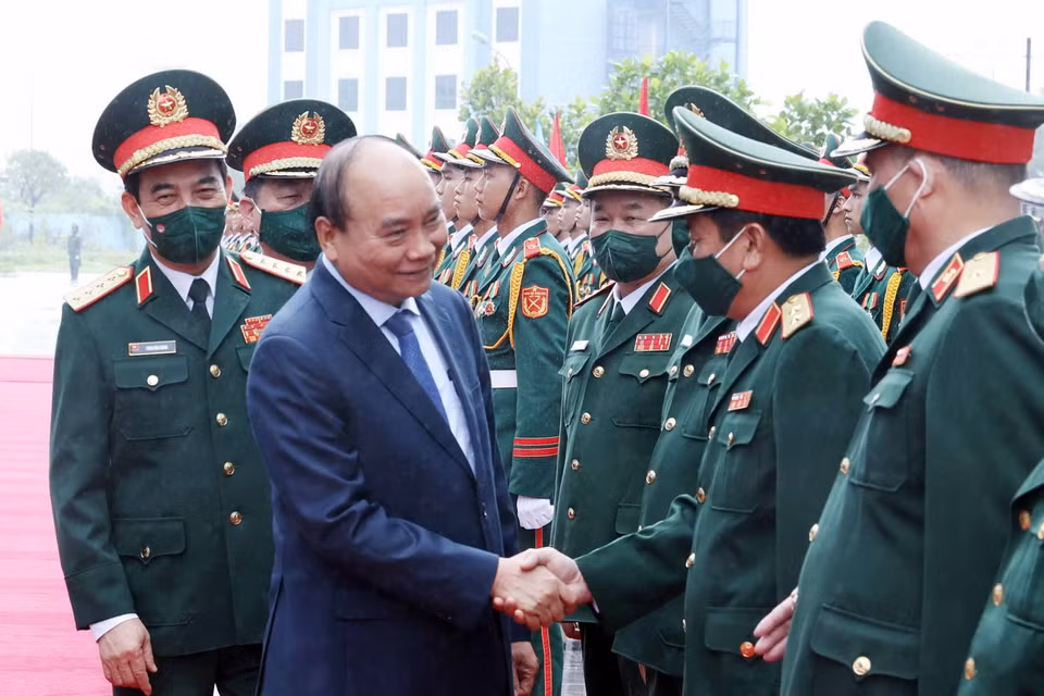 Chủ tịch nước Nguyễn Xuân Phúc với các đại biểu tham dự buổi lễ. (Ảnh: Thống Nhất/TTXVN)