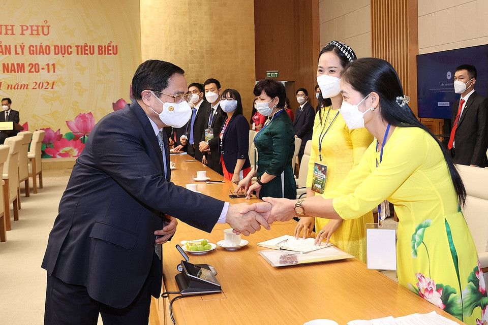 Buổi gặp mặt diễn ra nhân dịp kỷ niệm Ngày Nhà giáo Việt Nam. (Ảnh: Dương Giang/TTXVN)