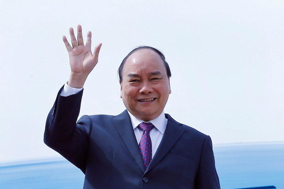 Trưa 4/11/2018, Thủ tướng Nguyễn Xuân Phúc và đoàn đại biểu cấp cao Việt Nam đến Thành phố Thượng Hải, Trung Quốc dự Hội chợ nhập khẩu quốc tế Trung Quốc lần thứ nhất. (Ảnh: Thống Nhất/TTXVN)