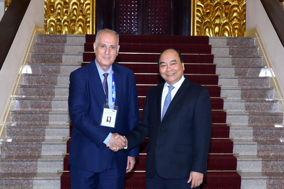 Thủ tướng Nguyễn Xuân Phúc và Ngài Aslan Aslannov, Chủ tịch OANA, Tổng giám đốc hãng Thông tấn AZERTAC (Azerbaijan) tại buổi tiếp. (Ảnh: Thống Nhất/TTXVN)