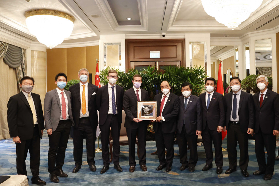 Chủ tịch nước Nguyễn Xuân Phúc tiếp các nhà đầu tư hạ tầng và tài chính quốc tế. (Ảnh: Thống Nhất/TTXVN)