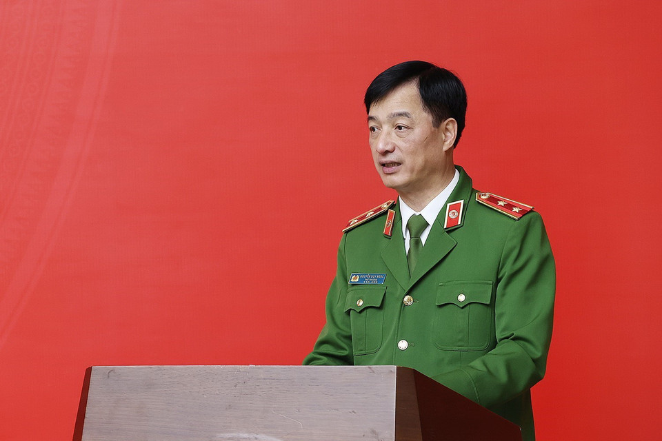 Thứ trưởng Bộ Công an Nguyễn Duy Ngọc, Tổ phó thường trực Tổ Công tác triển khai Đề án báo cáo tại hội nghị. (Ảnh: Dương Giang/TTXVN)